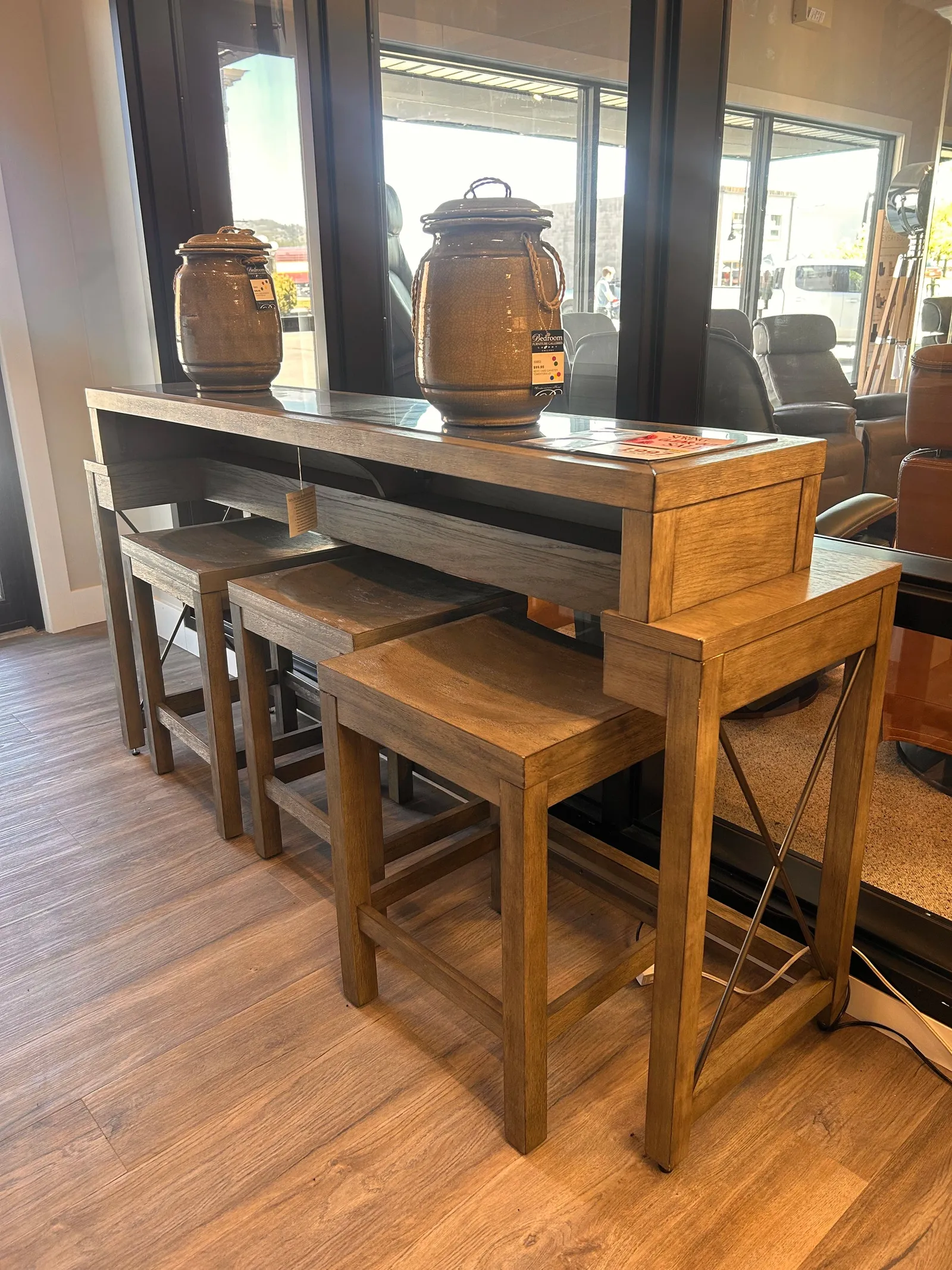 Console bar with inset bluestone top and three stools